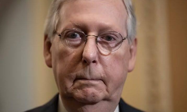 Mitch McConnell, seen here watching a man slowly drown